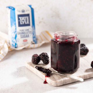 Jar of Blackberry jam made with Tate & Lyle Granulated Sugar, featured in the background