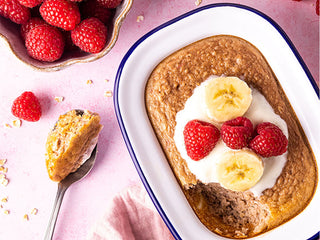 A tray of Breakfast Oat made with banana and raspberries