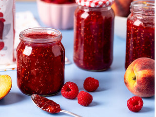 3 full jars of Raspberry and Peach jam 