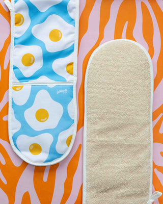 Oven glove  with egg pattern on a colourful background