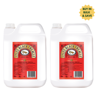 Two containers of Lyles Black Treacle with red labels on a white background.