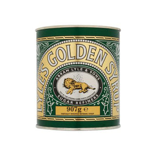 Lyle's Golden Syrup can with green and yellow label on a white background