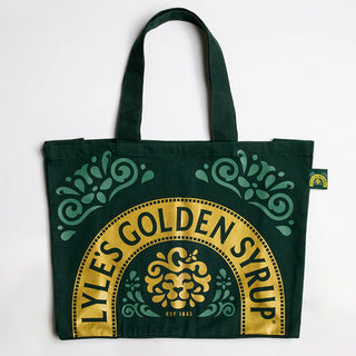 Green tote bag with Lyle's Golden Syrup logo on a white background