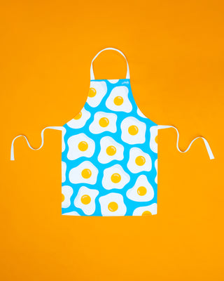 Blue apron printed with sunny eggs