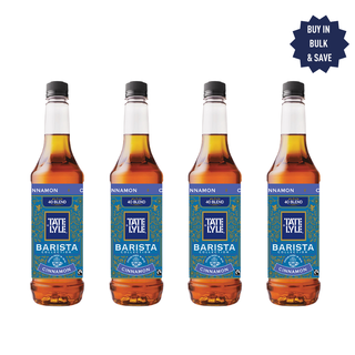 Four bottles of Tate & Lyle Barista cinnamon syrup on a white background
