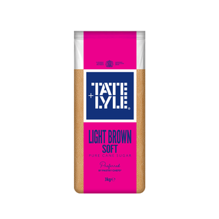 A 3kg bag of Tate & Lyle Light Brown Soft Pure Cane Sugar, featuring a bright pink and navy blue label with the brand logo, set against a plain white background.