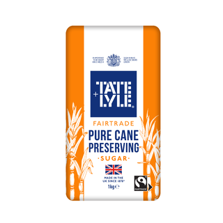 A 1kg bag of Tate Lyle Fairtrade Pure Cane Preserving Sugar, featuring orange side panels, a white centre, and a prominent blue brand logo.