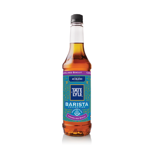 A bottle of Taste and Lyle Barista Caramelised Biscuit syrup, featuring a teal and gold label with purple accents, filled with amber-brown liquid, and topped with a black cap, set against a plain white background.