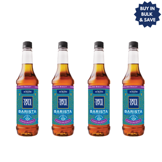 Four bottles of Tate and Lyle Caramelised Biscuit syrup, with a blue 'BUY IN BULK & SAVE' badge in the top right corner.