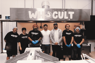 Who Cult bakery team picture in kitchen