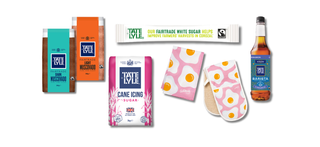 Collection of sugar products including a bottle of syrup, packets of sugars on a white background