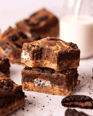 Brookie cake, layered with Cookie dough and brownie, made with Tate & Lyle and Whitworths Sugar